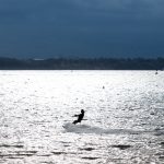 Kite Surfer im Gegenlicht am Vorabend der Kieler Woche